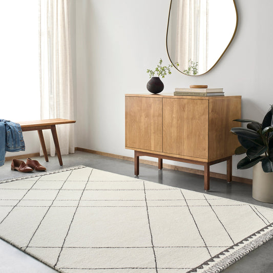 Arsenal Rug by Livabliss in cream, black. Made from main: 100% wool in a modern style.