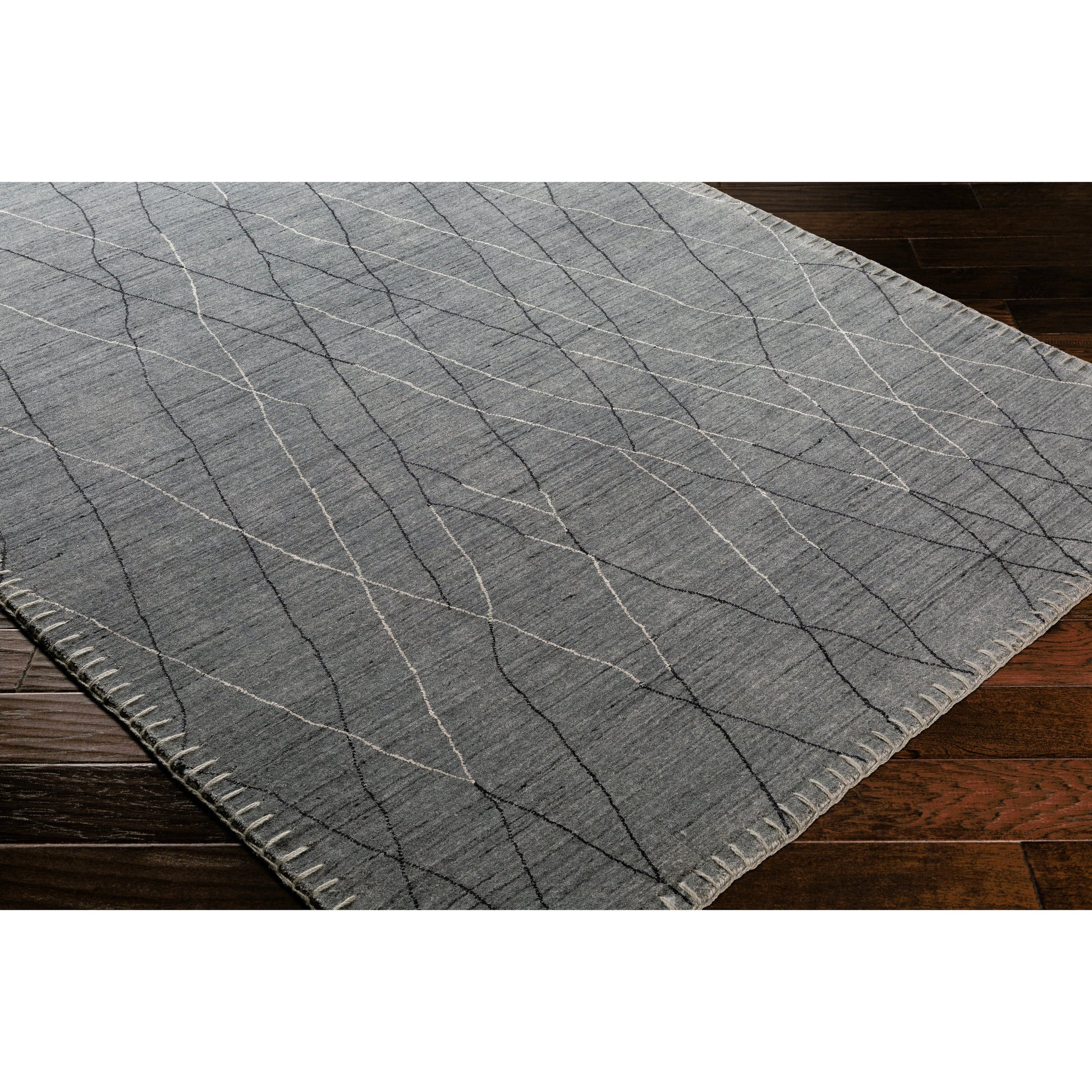 Arlequin Rug - 23661 by Surya in charcoal, medium gray, black. Made from unique in a unique style.