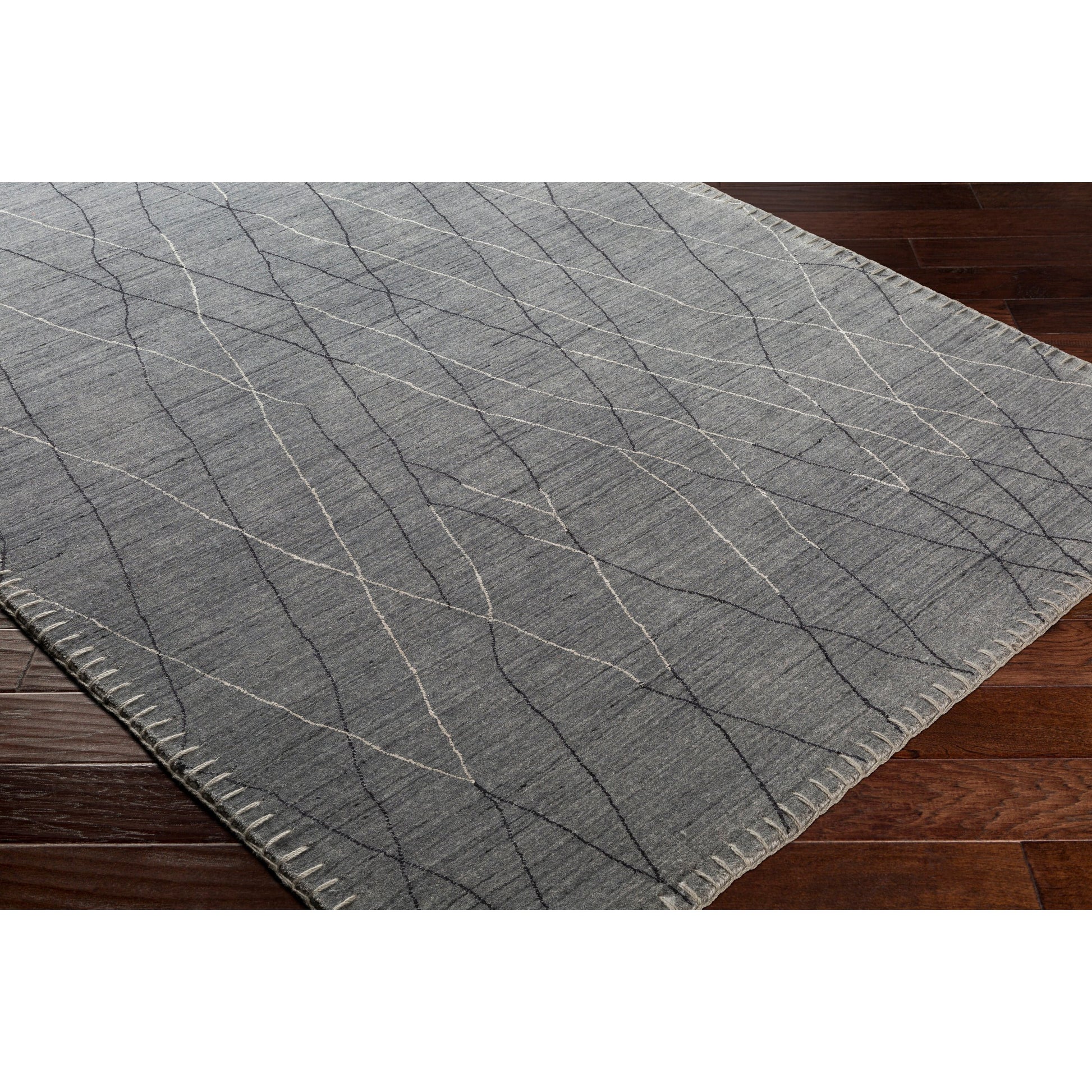 Arlequin Rug - 23661 by Surya in charcoal, medium gray, black. Made from unique in a unique style.