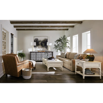 Americana Entertainment 4-Door Credenza by Hooker Furniture in molasses. Made from oak veneers with solid-wood edge top in a modern style.