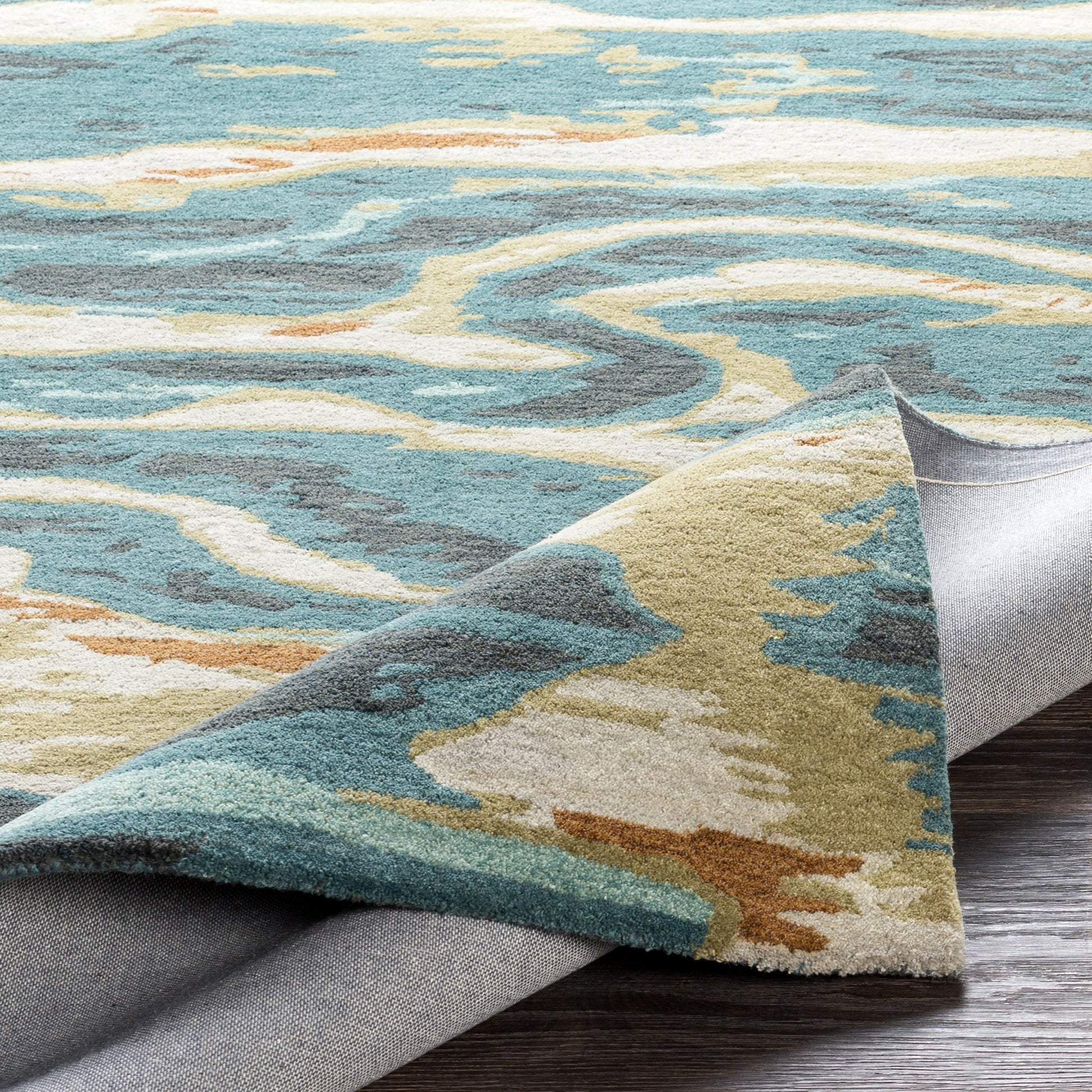 Artist Studio Rug - 20974 by Surya in dark blue, seafoam, brown, tan, blue, navy. Made from 100% new zealand wool in a unique style.