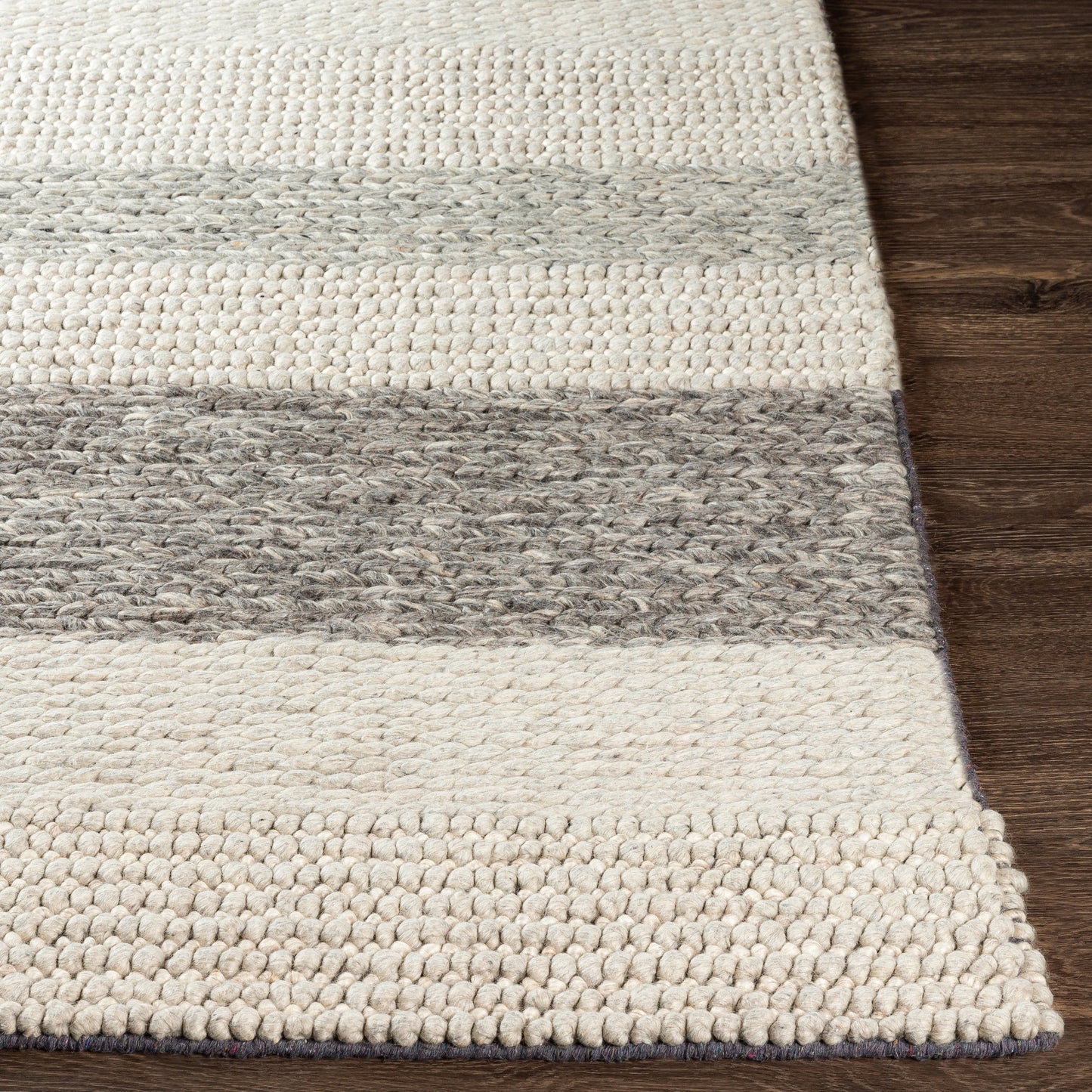 003 SI-1876726,SI-1876727 | Closeup | Asos ASS-2300 Rug by Surya in charcoal, medium gray, light gray. Made from 80% wool, 20% cotton in a unique style.