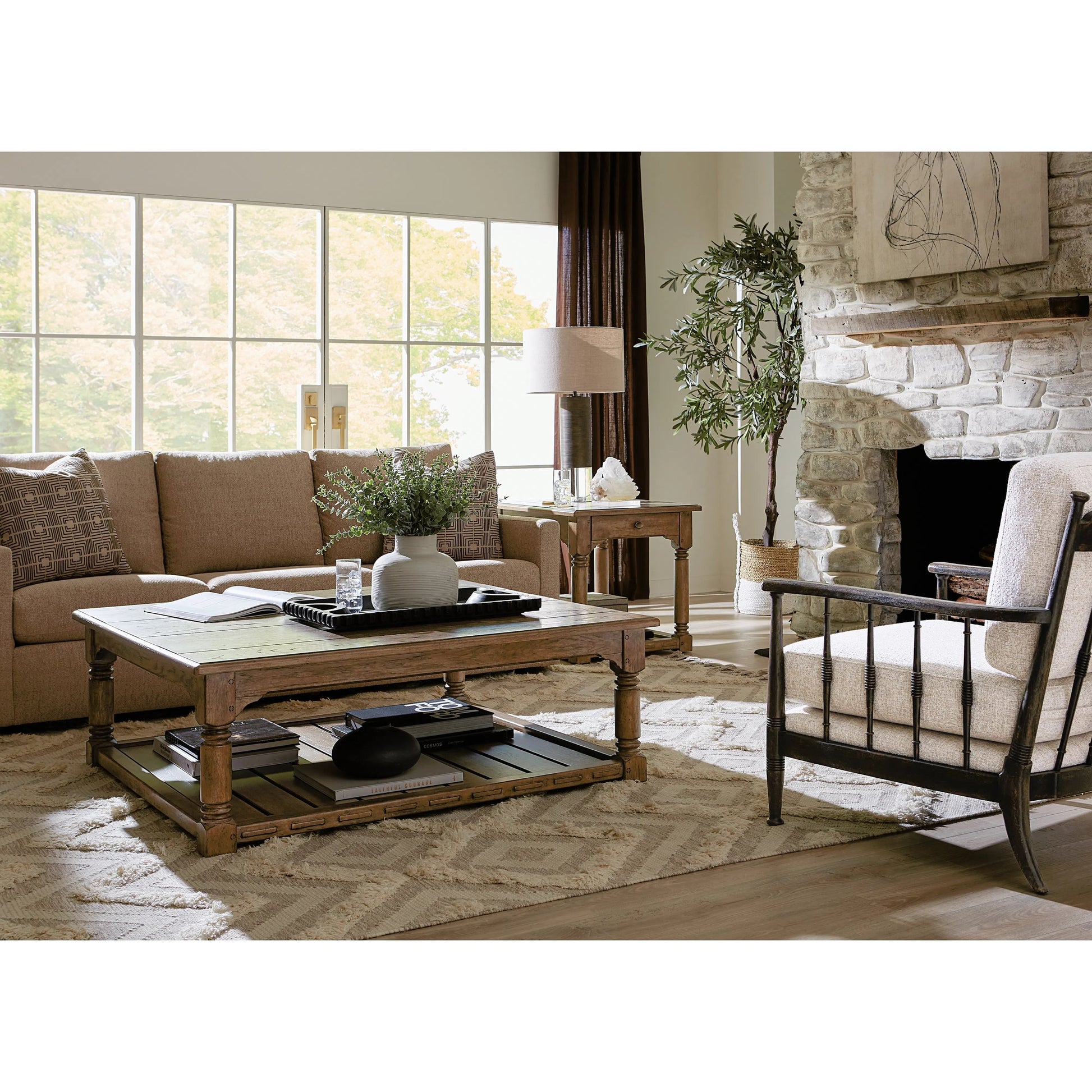 Americana Cocktail Table by Hooker Furniture in brown and honey finish. Made from oak veneers with solid-wood edge top in a modern style.