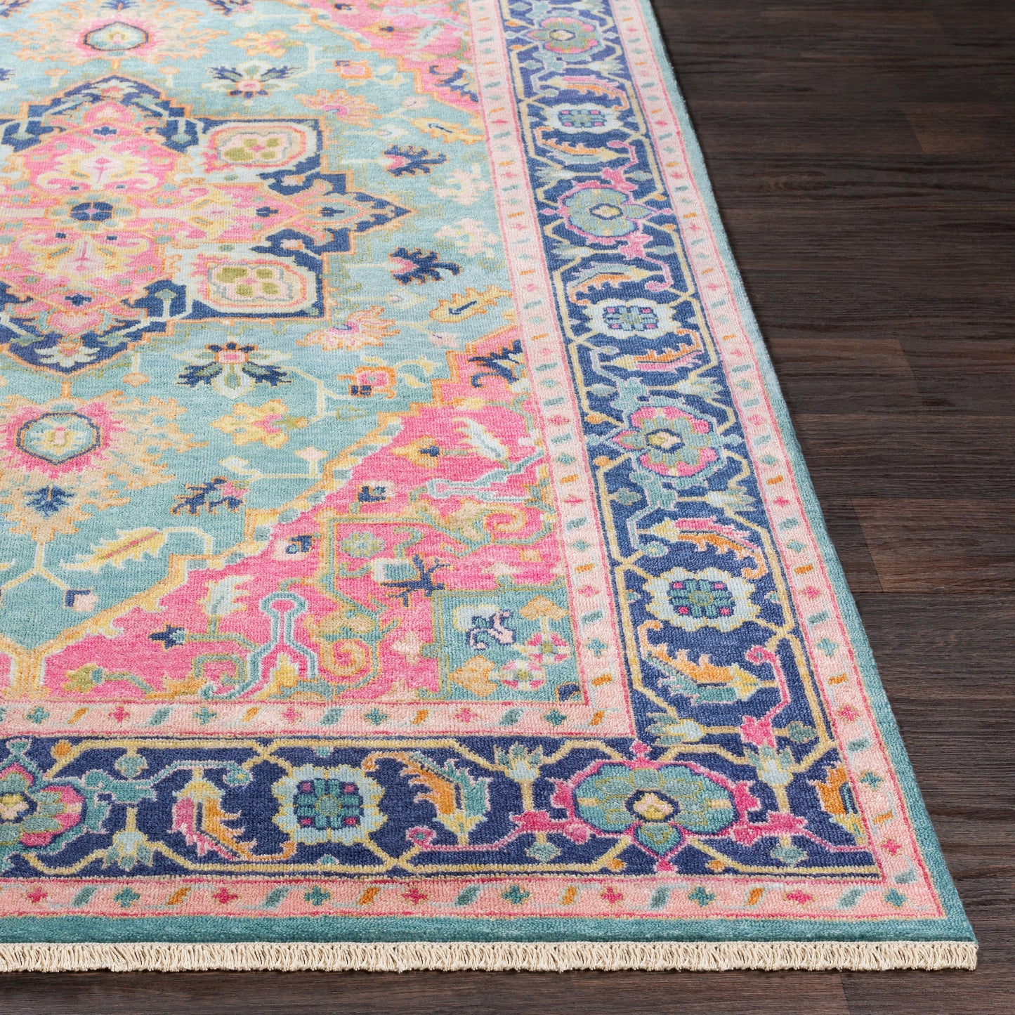 004 97589-20402 | Closeup | Antique Rug - 12639 by Surya in teal, rose, dark blue, seafoam, dusty coral, light brown. Made from 100% new zealand wool in a unique style.