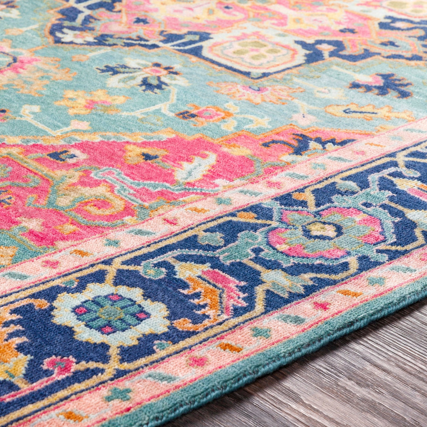 003 97589-20402 | Closeup | Antique Rug - 12639 by Surya in teal, rose, dark blue, seafoam, dusty coral, light brown. Made from 100% new zealand wool in a unique style.