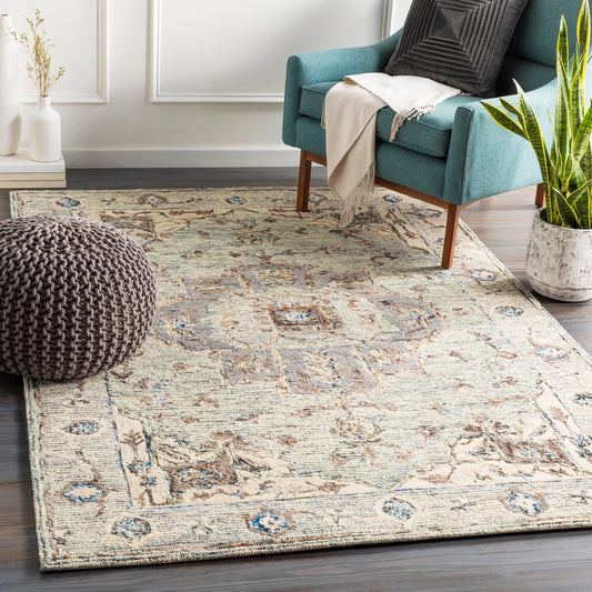 Avon Rug - 23573 by Surya in sea foam, khaki, camel, olive, dark blue, burnt orange. Made from 100% wool in a unique style.
