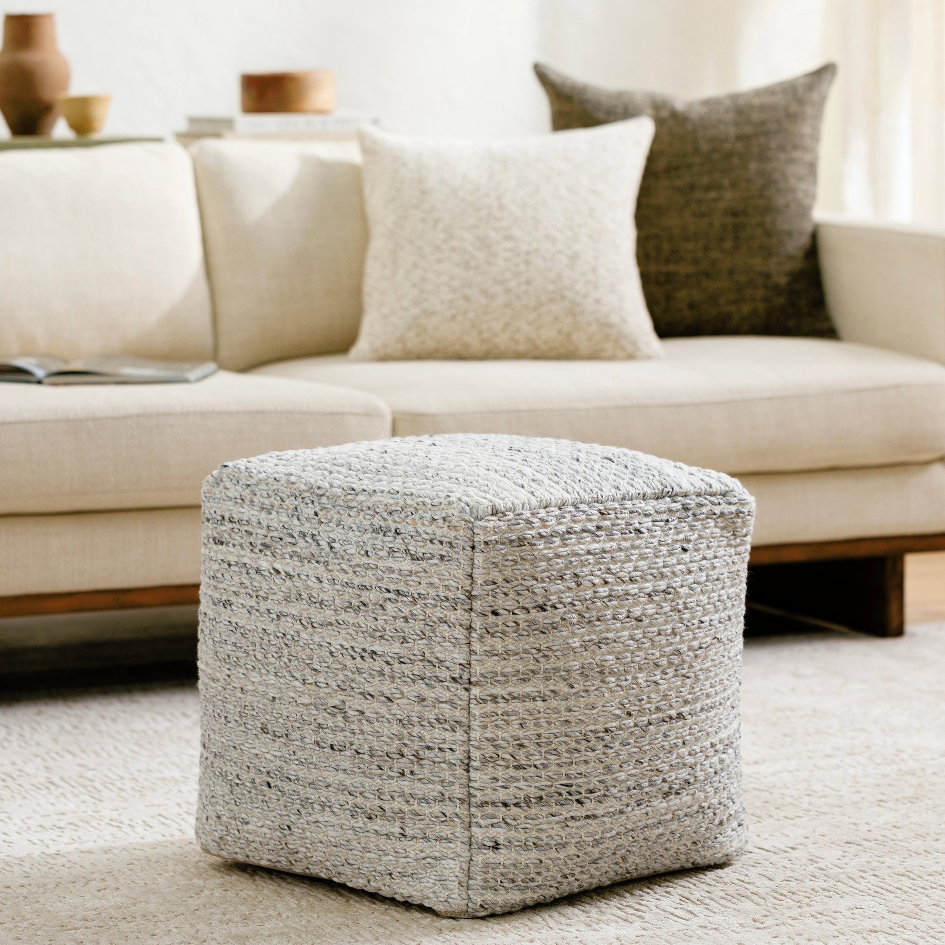 Averill Indoor/Outdoor Pouf by Surya in light silver, off-white, light grey, silver, ash. Made from top: 100% recycled pet yarn, bottom: 100% polyester, fill: 100% polybeads in a modern style.