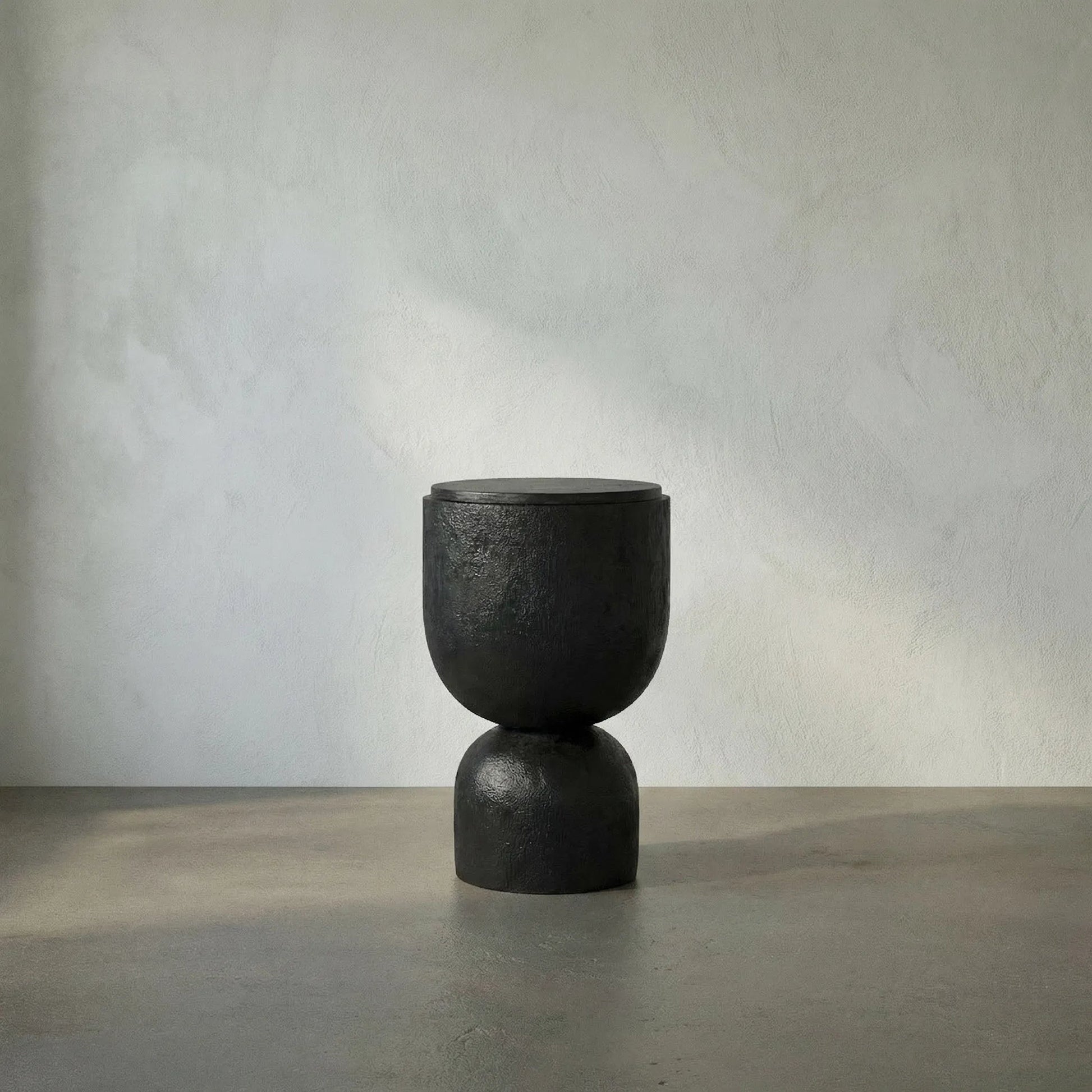 Kudoro Side Table by Noir in burnt black. Made from munggur and marble in a modern style.