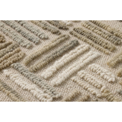 Perplexed Wall Decor by Loloi in green, ivory. Made from 100% wool in a rustic style.