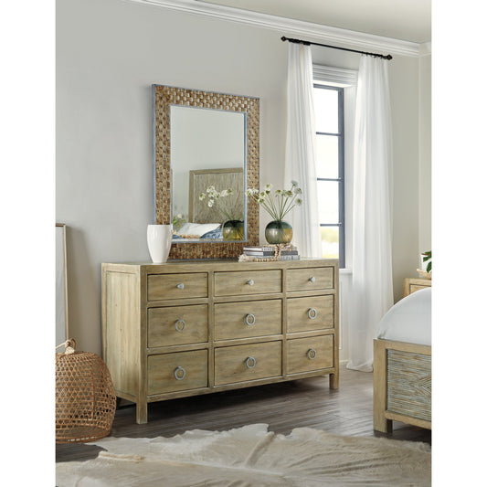 Surfrider Nine Drawer Dresser by Hooker Furniture in driftwood. Made from pecan veneers, cedar, felt panel, jewelry tray, self-closing undermount drawer guides, solid-wood edge top in a cottage & farmhouse style.