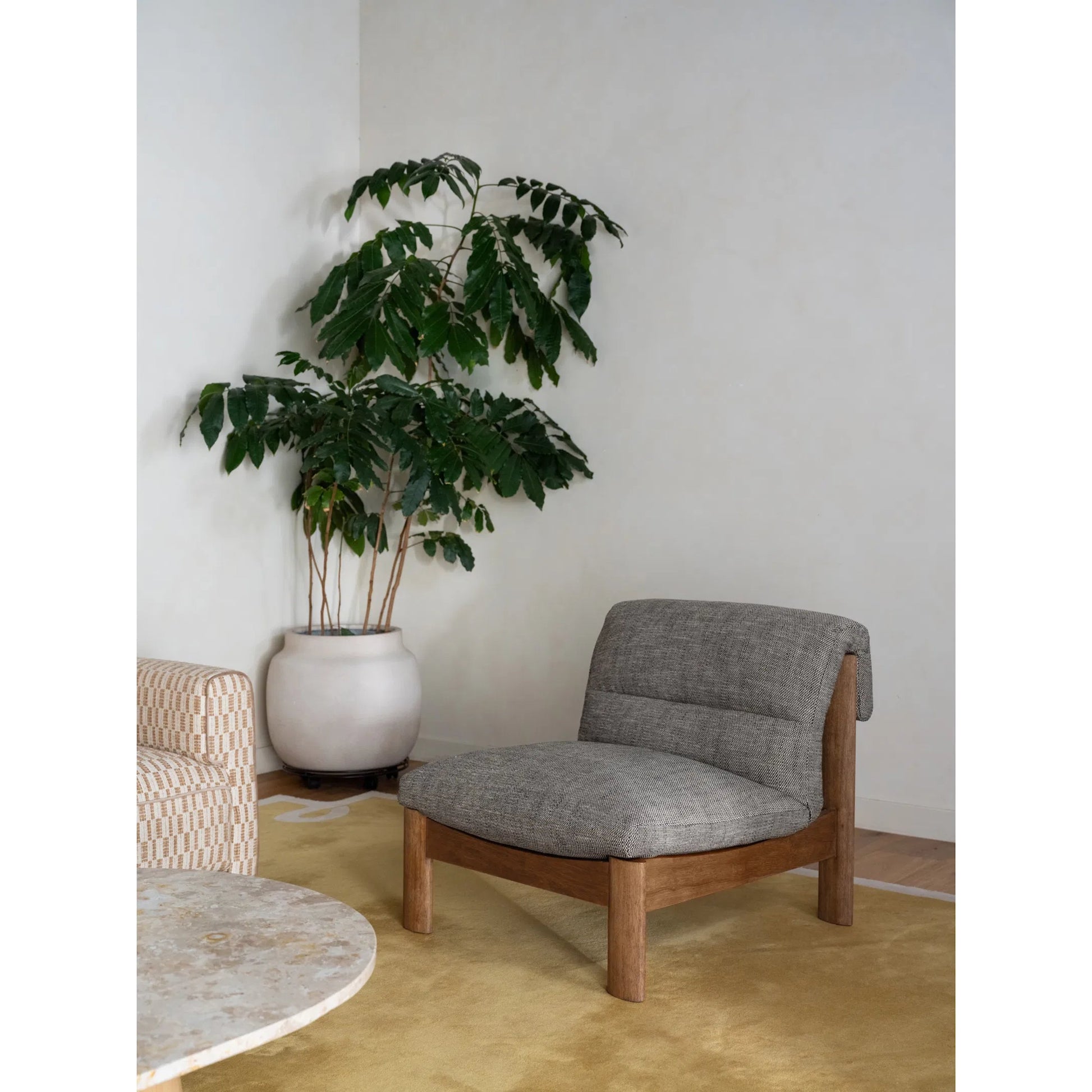 Pierce Accent Chair by Moe's Home Collection. Made from 100% polyester, solid rubber wood, plywood frame, rubber wood leg with plastic glider, foam, dacron, fiber seat in a unique style.