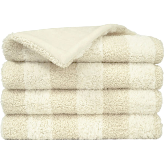 Tamed Throw by DV Kap Home in ivory. Made from 100% polyester in a unique style.