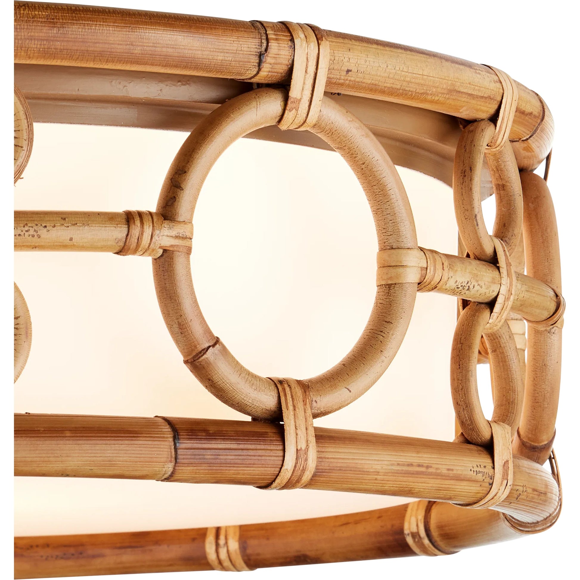 Tegal Flush Mount by Currey and Company in natural, khaki, white. Made from rattan, wrought iron, glass in a rustic style.