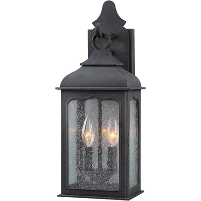 Henry Street Wall Lantern by Troy in colonial iron. Made from hand forged iron in a transitional style.