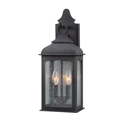 Henry Street Wall Lantern by Troy in colonial iron. Made from hand forged iron in a transitional style.