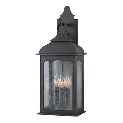 Henry Street Wall Lantern by Troy in colonial iron. Made from hand forged iron in a transitional style.