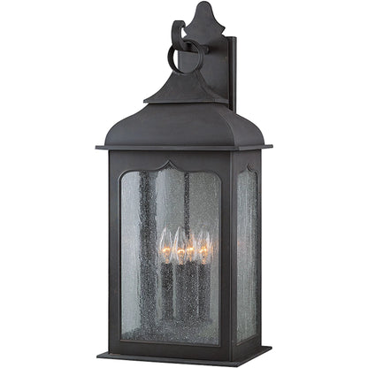 Henry Street Wall Lantern by Troy in colonial iron. Made from hand forged iron in a transitional style.