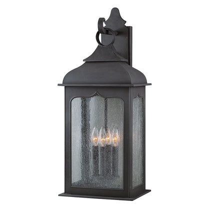 Henry Street Wall Lantern by Troy in colonial iron. Made from hand forged iron in a transitional style.