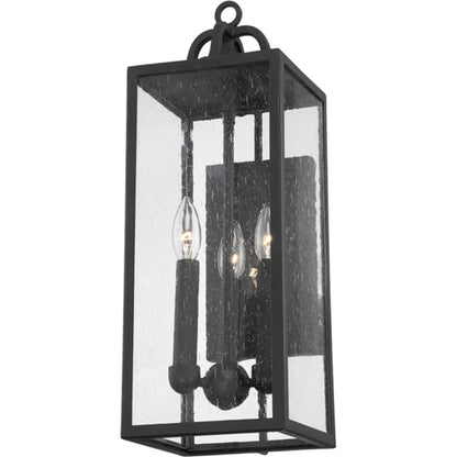 Caiden Exterior Wall Sconce by Troy in forged iron. Made from iron, steel in a transitional style.