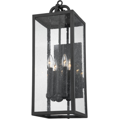 Caiden Exterior Wall Sconce by Troy in forged iron. Made from iron, steel in a transitional style.