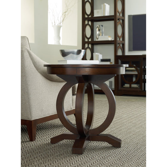 Kinsey Round End Table by Hooker Furniture in dark walnut. Made from quartered walnut veneer in a traditional style.