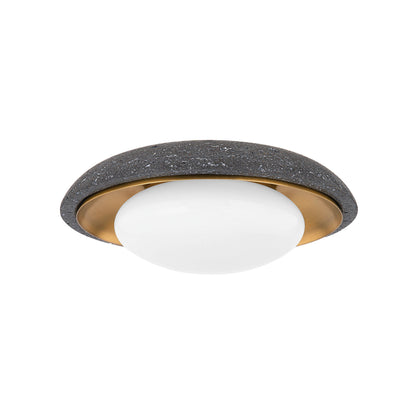Rocklin Wall Sconce by Troy in patina brass. Made from natural stone in a modern style.