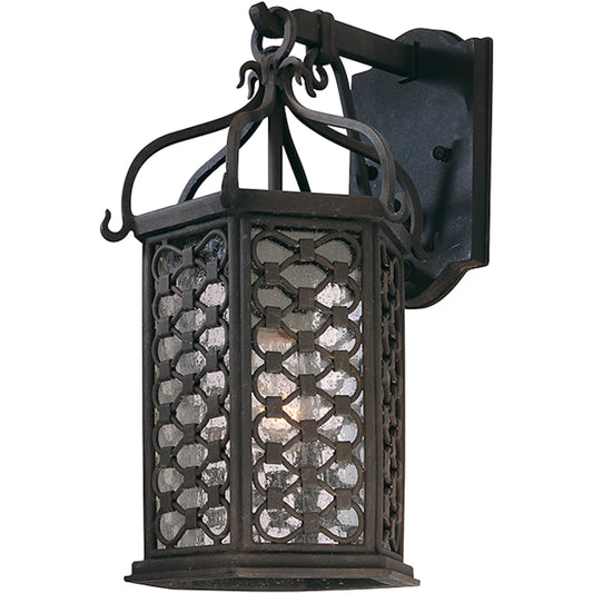 Los Olivos Wall Lantern by Troy in old iron. Made from hand forged iron in a unique style.