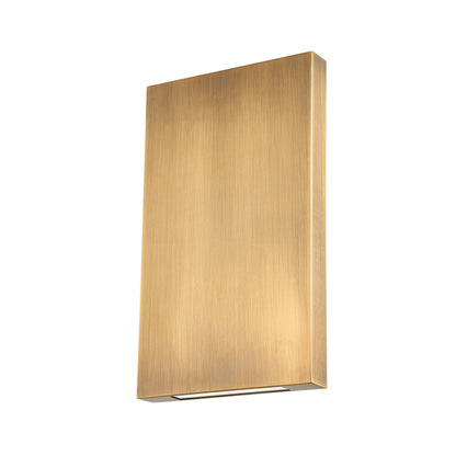 Thayne Exterior Wall Sconce by Troy in patina brass. Made from brass in a modern style.