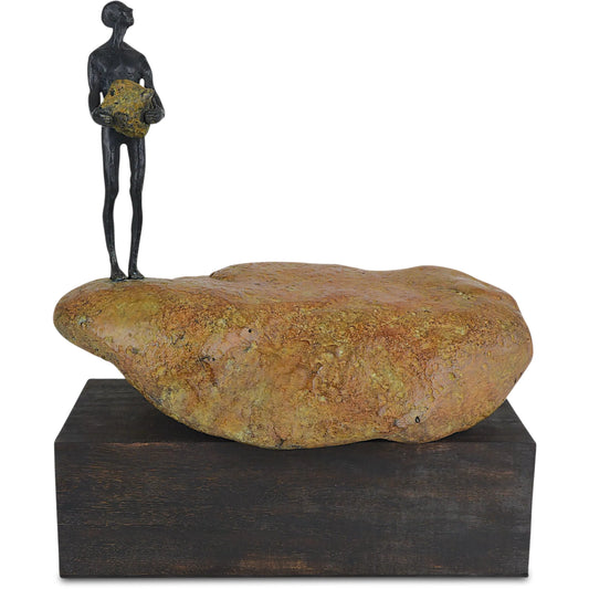 Man on Rock by Currey and Company in brown, bronze, green. Made from bronze in a unique style.