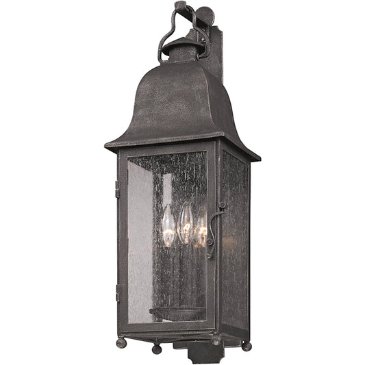 Larchmont Wall Lantern by Troy in aged pewter. Made from hand forged iron in a traditional style.