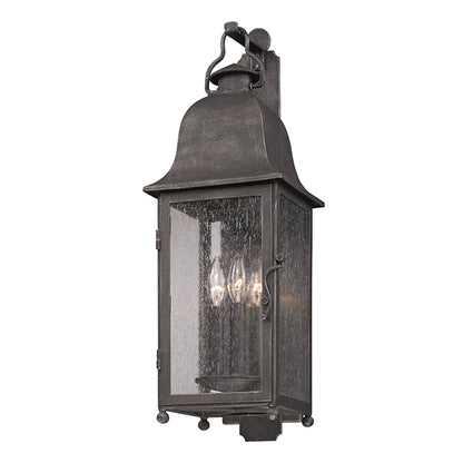 Larchmont 3 Light 25 inch Vintage Bronze Outdoor Wall Sconce by Troy in aged pewter. Made from hand forged iron in a traditional style.