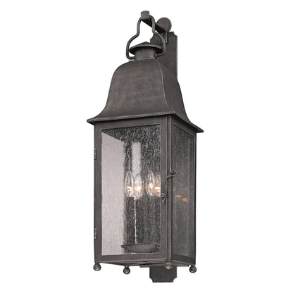 Larchmont Wall Sconce by Troy in vintage bronze. Made from hand forged iron in a unique style.