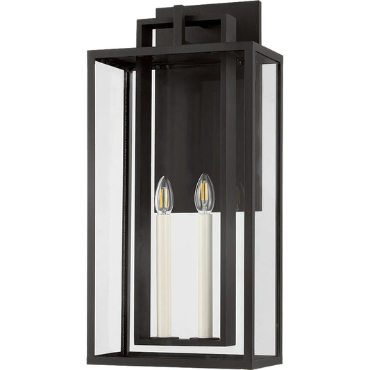 Amire Exterior Wall Sconce by Troy in textured black. Made from aluminum in a unique style.