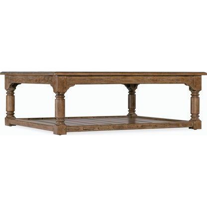 Americana Cocktail Table by Hooker Furniture in brown and honey finish. Made from oak veneers with solid-wood edge top in a modern style.