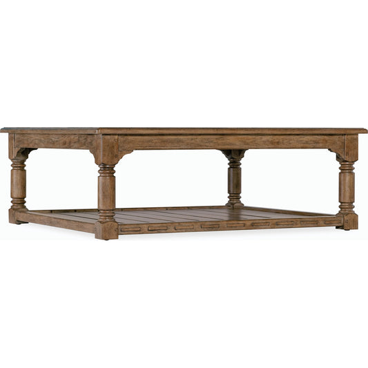 Americana Cocktail Table by Hooker Furniture in brown and honey finish. Made from oak veneers with solid-wood edge top in a modern style.