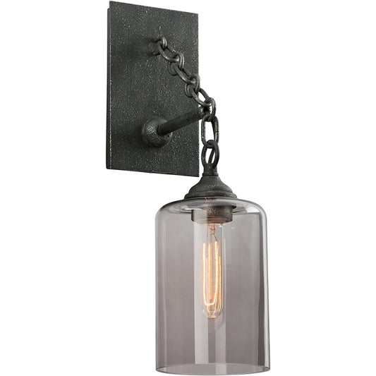 Gotham Wall Sconce by Troy in aged pewter. Made from hand worked iron in a unique style.