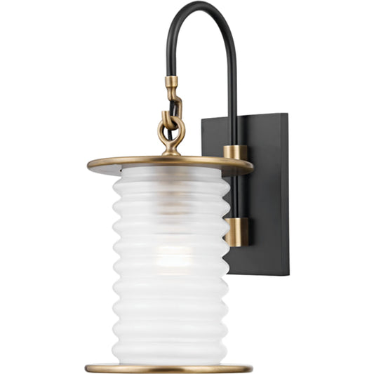 Danvers Wall Sconce by Troy in patina brass, textured black. Made from aluminum, stainless steel in a traditional style.