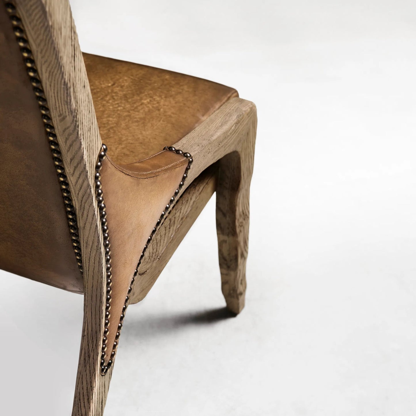 008 SI-2462588 | Closeup | Echo Canyon Leather Side Chair (Set of 2) by Jonathan Charles in faded oak. Made from oak in a traditional style.
