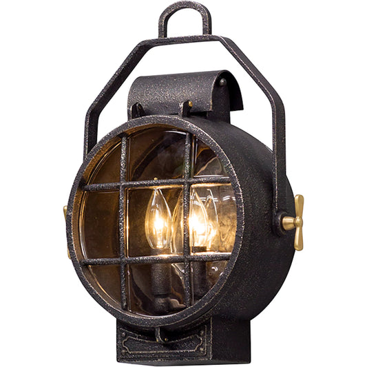 Point Lookout Wall Lantern by Troy in aged silver with pol brass accent. Made from cast aluminum in a traditional style.