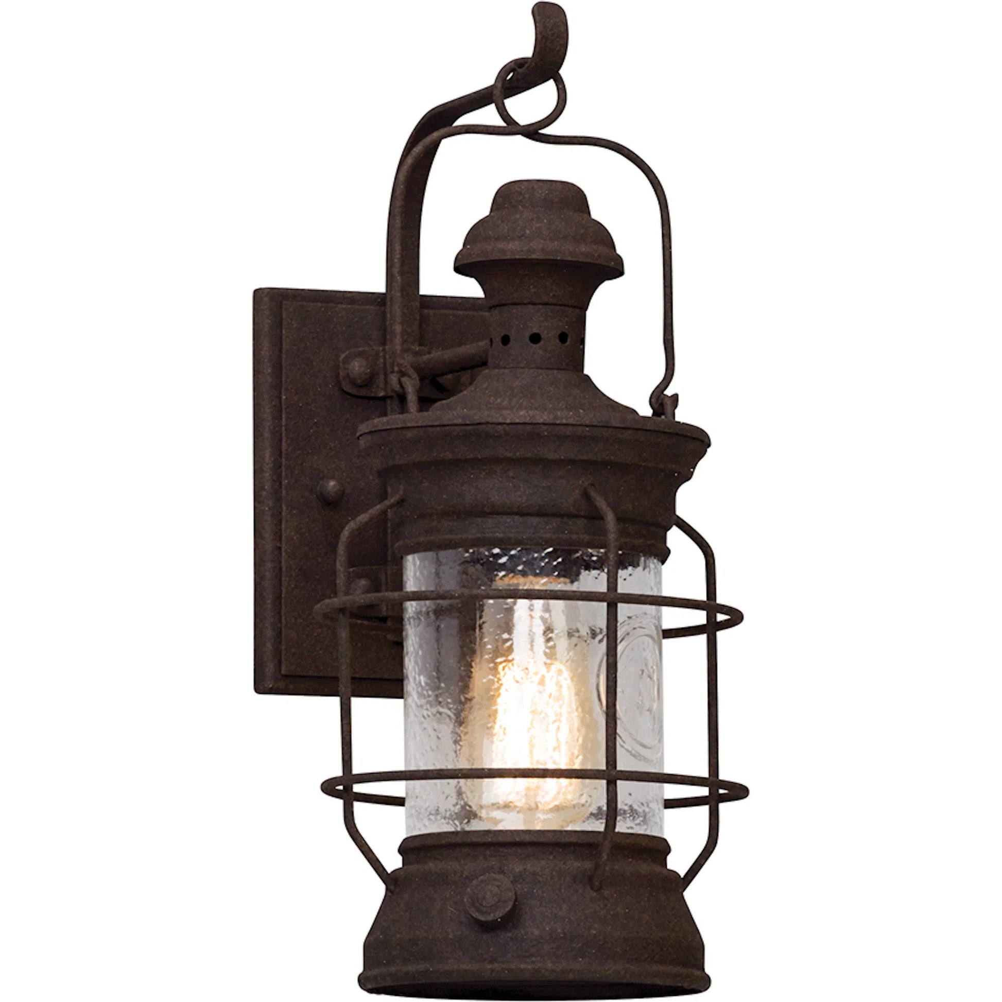 Atkins Wall Lantern by Troy in centennial rust. Made from hand worked iron, aluminum in a traditional style.