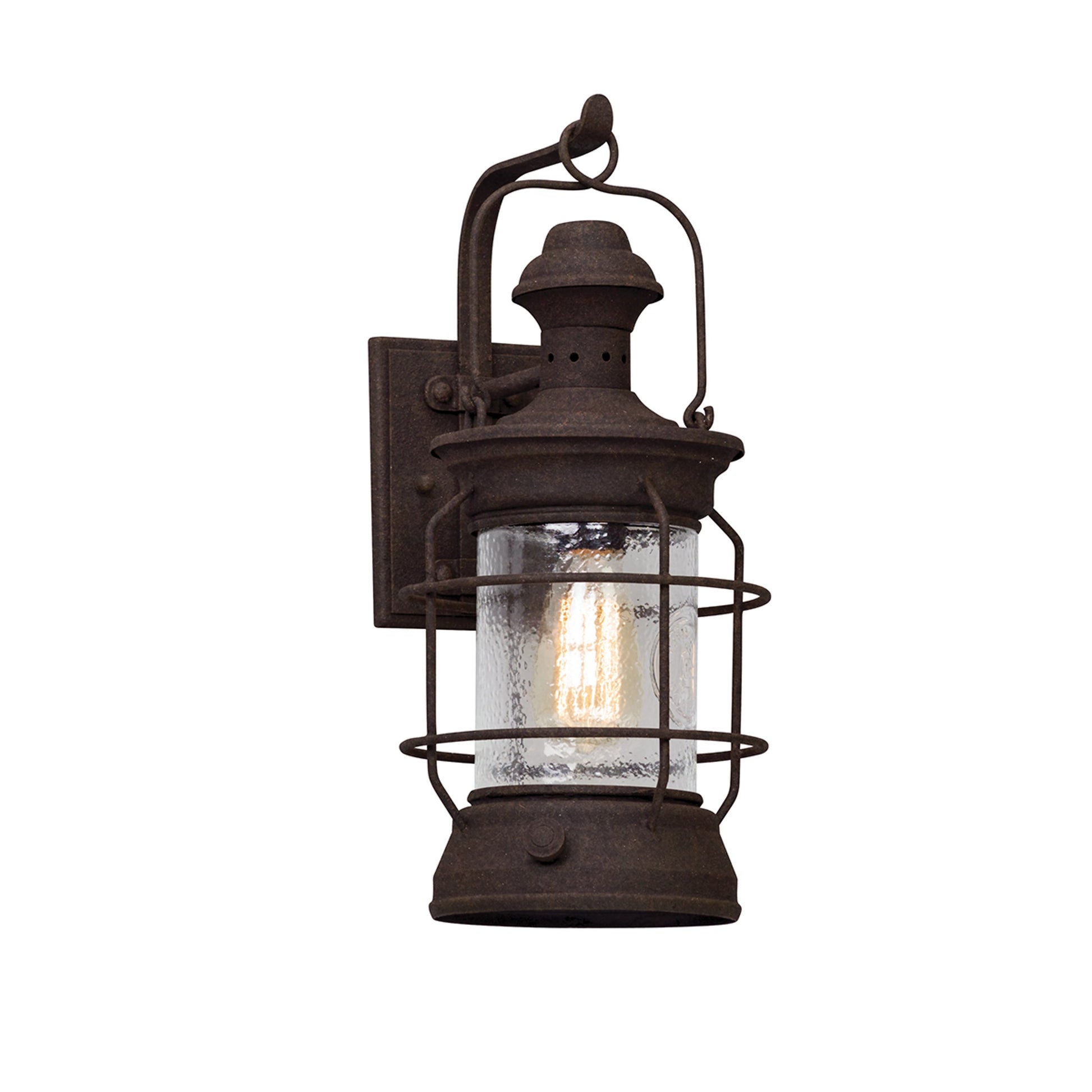 Atkins Wall Lantern by Troy in centennial rust. Made from hand-worked iron in a rustic style.