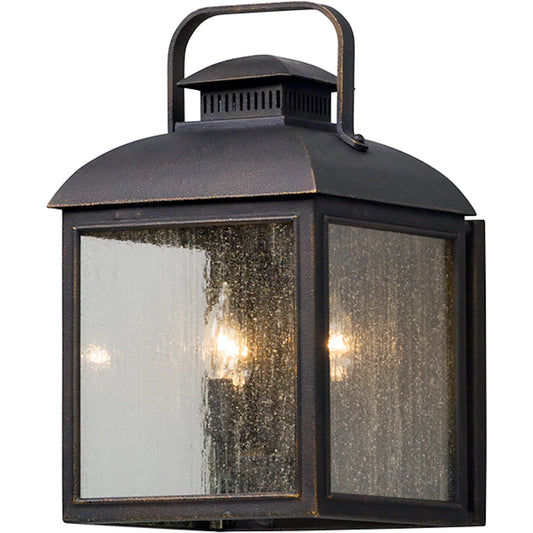 Chamberlain Wall Sconce by Troy in vintage bronze. Made from solid aluminum in a unique style.