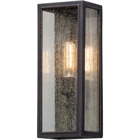 Dixon Wall Sconce by Troy in vintage bronze. Made from hand worked aluminum in a unique style.