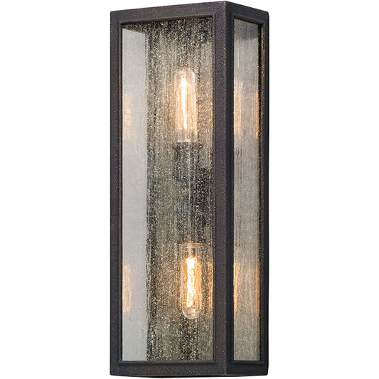Dixon Wall Lantern by Troy in vintage bronze. Made from hand worked aluminum in a modern style.