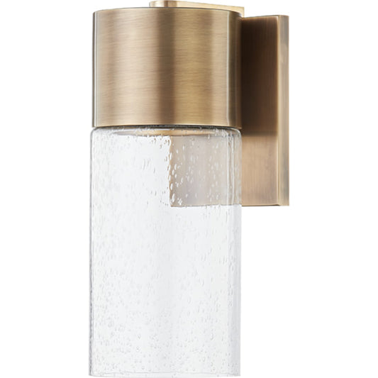 Pristine Exterior Wall Sconce by Troy in patina brass. Made from aluminum, stainless steel in a transitional style.