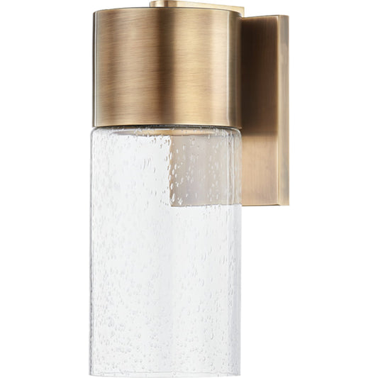 Pristine Exterior Wall Sconce by Troy in patina brass. Made from aluminum, stainless steel in a transitional style.