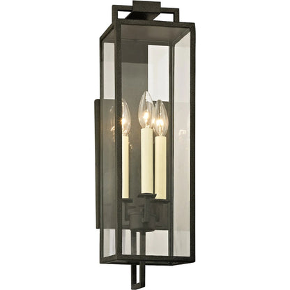 Beckham Wall Sconce by Troy in forged iron. Made from hand worked iron in a modern style.