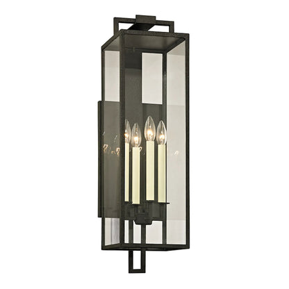 Beckham Wall Sconce by Troy in forged iron. Made from hand worked iron in a modern style.