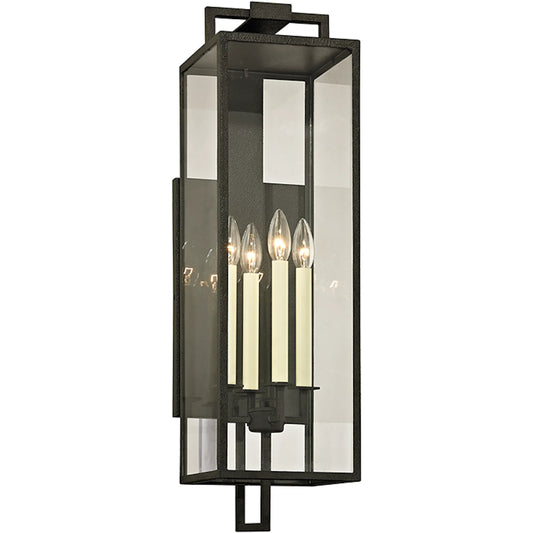 Beckham Wall Sconce by Troy in forged iron. Made from hand worked iron in a modern style.