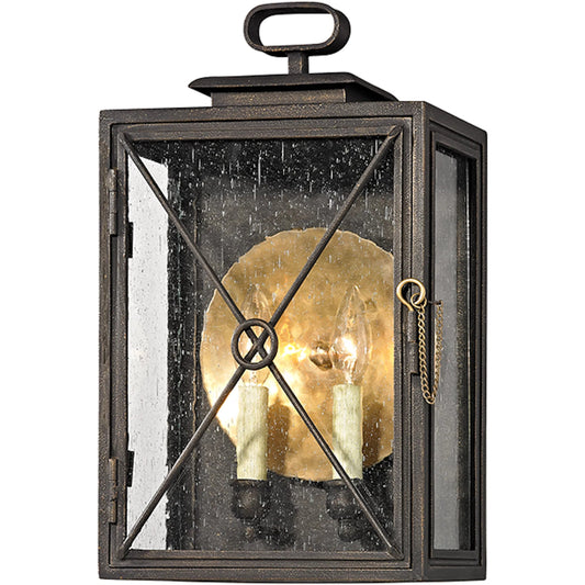 Randolph Wall Sconce by Troy in vintage bronze. Made from hand worked iron, brass in a transitional style.